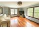 Bright living room with hardwood floors, large windows, and comfortable seating offering style and function at 861 Marion Se Ave, Atlanta, GA 30312