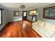 Open-concept living room featuring hardwood floors, lots of light and comfortable seating at 861 Marion Se Ave, Atlanta, GA 30312