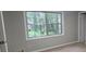 Bedroom view showcases natural lighting and carpeted floors at 2035 Northland Dr, Lawrenceville, GA 30044