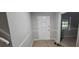 Welcoming foyer with a tiled floor, front door, and view into another room at 2035 Northland Dr, Lawrenceville, GA 30044