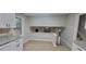 Spacious kitchen layout with granite countertops and tile flooring at 2035 Northland Dr, Lawrenceville, GA 30044