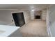 Spacious living room featuring a fireplace, built-in shelves, and sliding glass doors at 2035 Northland Dr, Lawrenceville, GA 30044