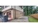 Side view of the home with a two car garage at 2035 Northland Dr, Lawrenceville, GA 30044
