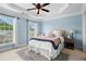 Cozy bedroom with a tray ceiling and lots of natural light at 2343 Limehurst Ne Dr, Atlanta, GA 30319