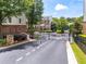 Community Entrance with guard house and gate at 2343 Limehurst Ne Dr, Atlanta, GA 30319