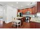 Modern kitchen with granite countertops, stainless steel appliances, and cherry cabinets at 2343 Limehurst Ne Dr, Atlanta, GA 30319