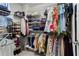 Walk-in closet with extensive shelving and hanging space for optimal storage at 2343 Limehurst Ne Dr, Atlanta, GA 30319