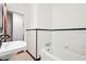 Bathroom with vintage tile and a pedestal sink and tub at 3211 Hollydale Drive Sw, Atlanta, GA 30311