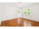 Bedroom with hardwood floors, a window, and neutral walls at 3211 Hollydale Drive Sw, Atlanta, GA 30311