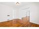 Hardwood floors with neutral walls that lead to other areas of the home at 3211 Hollydale Drive Sw, Atlanta, GA 30311