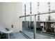 Cozy balcony with a view of the building's courtyard and outdoor space at 620 Glen Iris Dr # 223, Atlanta, GA 30308