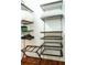 Well-organized walk-in closet featuring shelving and drawers, perfect for maximizing storage at 620 Glen Iris Dr # 223, Atlanta, GA 30308