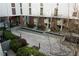 View of the lovely courtyard with seating areas and water features at 620 Glen Iris Dr # 223, Atlanta, GA 30308