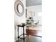 Open-concept dining area with a modern table, stylish chairs, and unique chandelier, perfect for entertaining guests at 620 Glen Iris Dr # 223, Atlanta, GA 30308