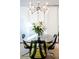 Dining area featuring a modern light fixture and seating for four at 620 Glen Iris Dr # 223, Atlanta, GA 30308