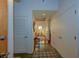 Spacious entryway features concrete floors, white walls, and a glimpse into a living space with hardwood floors at 620 Glen Iris Dr # 223, Atlanta, GA 30308