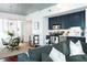 Modern kitchen with dark blue cabinets and stainless steel appliances at 620 Glen Iris Dr # 223, Atlanta, GA 30308