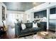 Open-concept living room featuring a modern kitchen, dining area, and comfortable seating at 620 Glen Iris Dr # 223, Atlanta, GA 30308