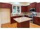 Bright and spacious kitchen with a center island, stainless appliances, and lots of cabinetry at 2552 White Oak Dr, Decatur, GA 30032