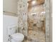 Modern bathroom featuring a glass shower with beautiful tile work and updated fixtures at 3280 Pebble Hill Dr, Marietta, GA 30062