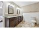 Bathroom featuring dual sinks with granite counters, providing ample space and functionality at 3280 Pebble Hill Dr, Marietta, GA 30062