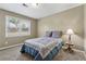 Inviting bedroom with a comfy bed, soft carpet, and a window, creating a cozy atmosphere at 3280 Pebble Hill Dr, Marietta, GA 30062