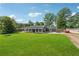Lovely one-story home with a spacious front yard and ample parking space at 3280 Pebble Hill Dr, Marietta, GA 30062