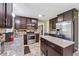 Modern kitchen featuring stainless steel appliances, granite countertops, and a functional island at 3280 Pebble Hill Dr, Marietta, GA 30062