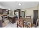 Updated kitchen featuring stainless steel appliances, a granite island, and dark wood cabinets at 3280 Pebble Hill Dr, Marietta, GA 30062