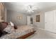 Bedroom with ceiling fan and plush carpet flooring at 4665 Idlewood Dr, Cumming, GA 30040