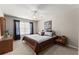 Comfortable bedroom with ceiling fan, neutral paint, and ample natural light at 4665 Idlewood Dr, Cumming, GA 30040
