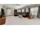 Cozy living room featuring a plush carpet and a comfortable sectional at 4665 Idlewood Dr, Cumming, GA 30040