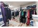 Spacious walk-in closet with ample shelving and hanging space for organized storage at 4665 Idlewood Dr, Cumming, GA 30040