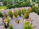 Aerial view of community with landscaping and a central gazebo at 630 Birch River Ln, Lawrenceville, GA 30043