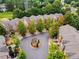Aerial view of community with landscaping and a central gazebo at 630 Birch River Ln, Lawrenceville, GA 30043