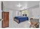 Primary bedroom featuring tile floors, good natural light, and ample closet space at 630 Birch River Ln, Lawrenceville, GA 30043