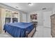 Large bedroom features natural light, tile flooring, and ample closet space at 630 Birch River Ln, Lawrenceville, GA 30043
