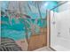 Shower featuring a custom tropical mural, turning your everyday routine into an escape to paradise at 630 Birch River Ln, Lawrenceville, GA 30043
