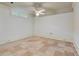 Finished basement space featuring tile flooring and crown molding, perfect for customizable living at 1640 Nottingham Ne Way, Atlanta, GA 30309