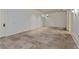 Spacious basement featuring neutral walls and tile flooring, offering a versatile space for recreation or storage at 1640 Nottingham Ne Way, Atlanta, GA 30309