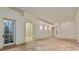 Finished basement showcasing multiple doorways, tile floors, and neutral decor, a versatile space for any need at 1640 Nottingham Ne Way, Atlanta, GA 30309
