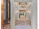 Elegant foyer with high ceilings, decorative chandelier, and beautiful tile flooring at 1640 Nottingham Ne Way, Atlanta, GA 30309