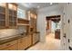 Charming kitchen with wooden cabinets, stainless steel appliances, and stone countertops at 1640 Nottingham Ne Way, Atlanta, GA 30309