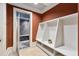 Mud room with mosaic tiled room and bench and coat rack storage at 1640 Nottingham Ne Way, Atlanta, GA 30309