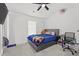 Cozy bedroom with carpet, ceiling fan, and a queen bed at 116 Eleanora Park, Loganville, GA 30052
