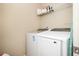 Convenient laundry room equipped with a washer and dryer at 319 Nobleman Way, Canton, GA 30114