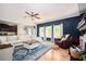 Comfortable living room with an area rug, cozy seating, neutral walls, and recessed lighting at 319 Nobleman Way, Canton, GA 30114