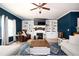 Spacious living room with built-in shelving, fireplace, and comfortable seating at 319 Nobleman Way, Canton, GA 30114