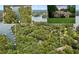Scenic aerial view of the property showcasing the lush greenery and lake access at 3445 Strawberry Ln, Cumming, GA 30041