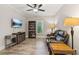 Inviting living room featuring hardwood floors, a ceiling fan, and comfortable seating at 3445 Strawberry Ln, Cumming, GA 30041